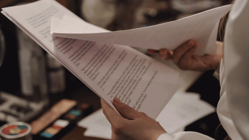 Someone reading a theatre script