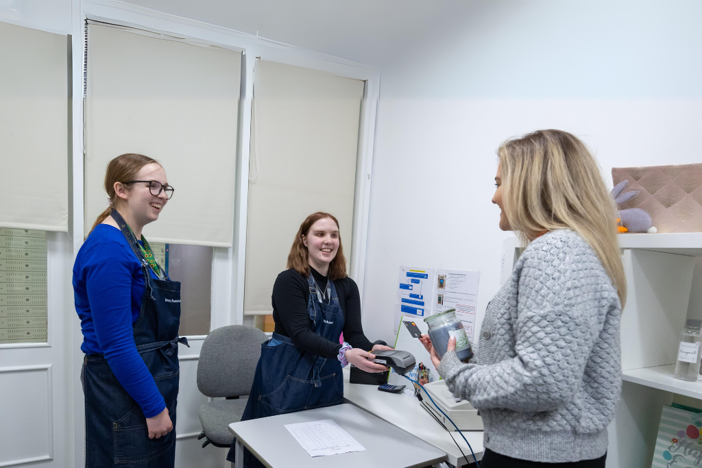 Inclusive Learning Retail Business students working in the shop