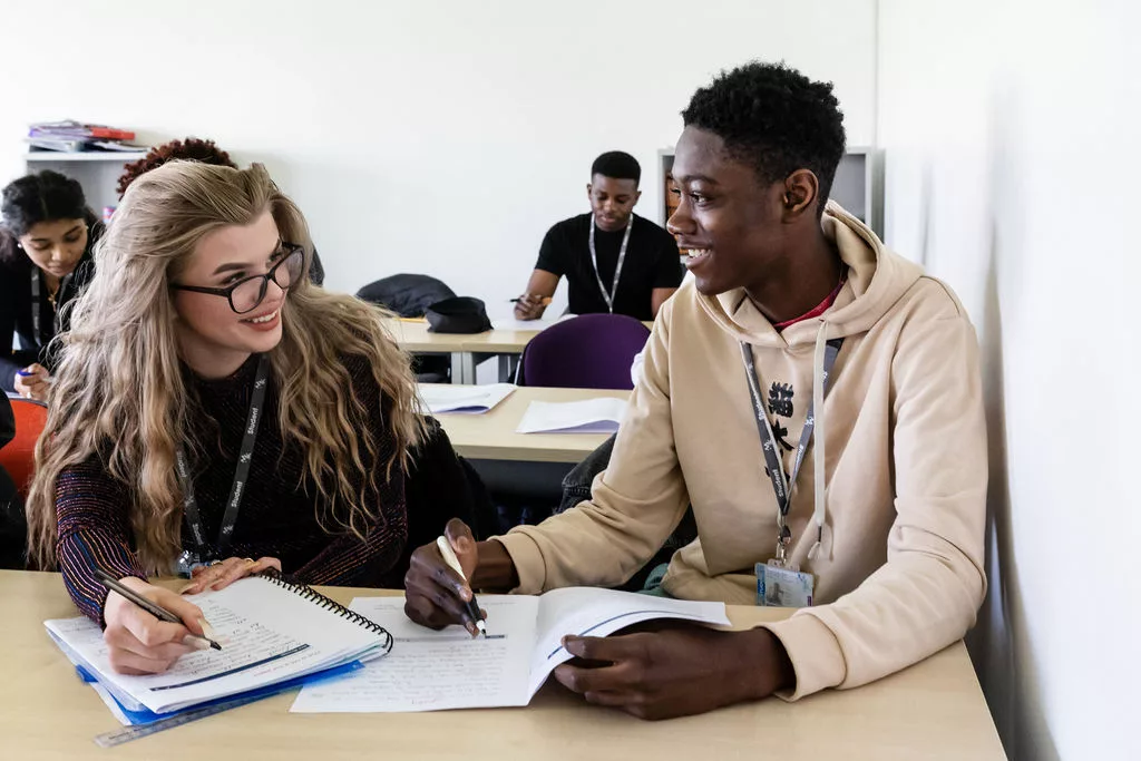 students working at a desk
