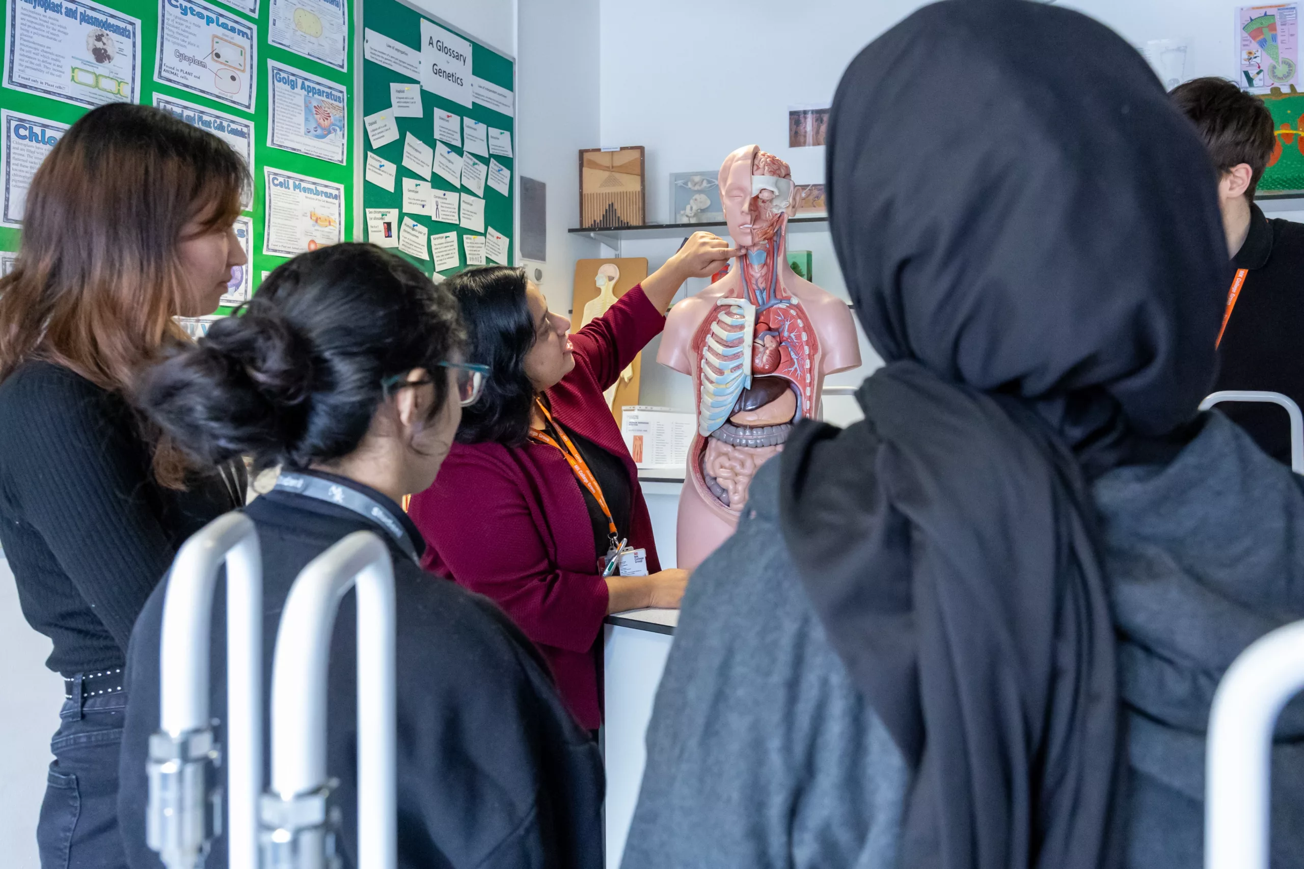 Biology students in class with teacher