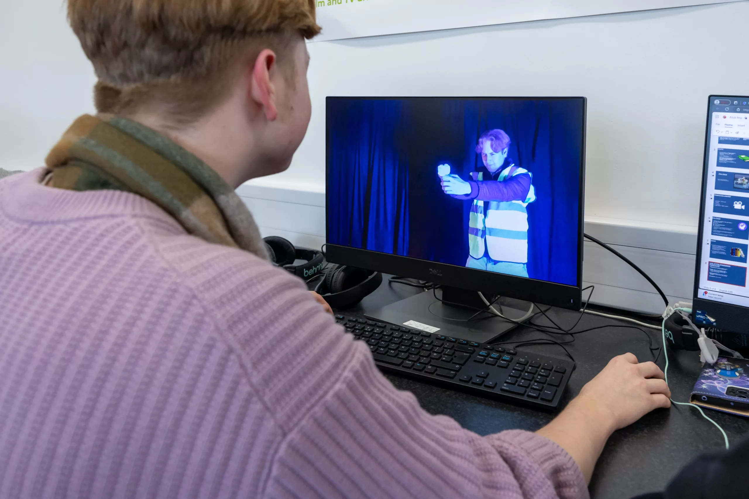 Students playing video games in a gaming and esports training session.