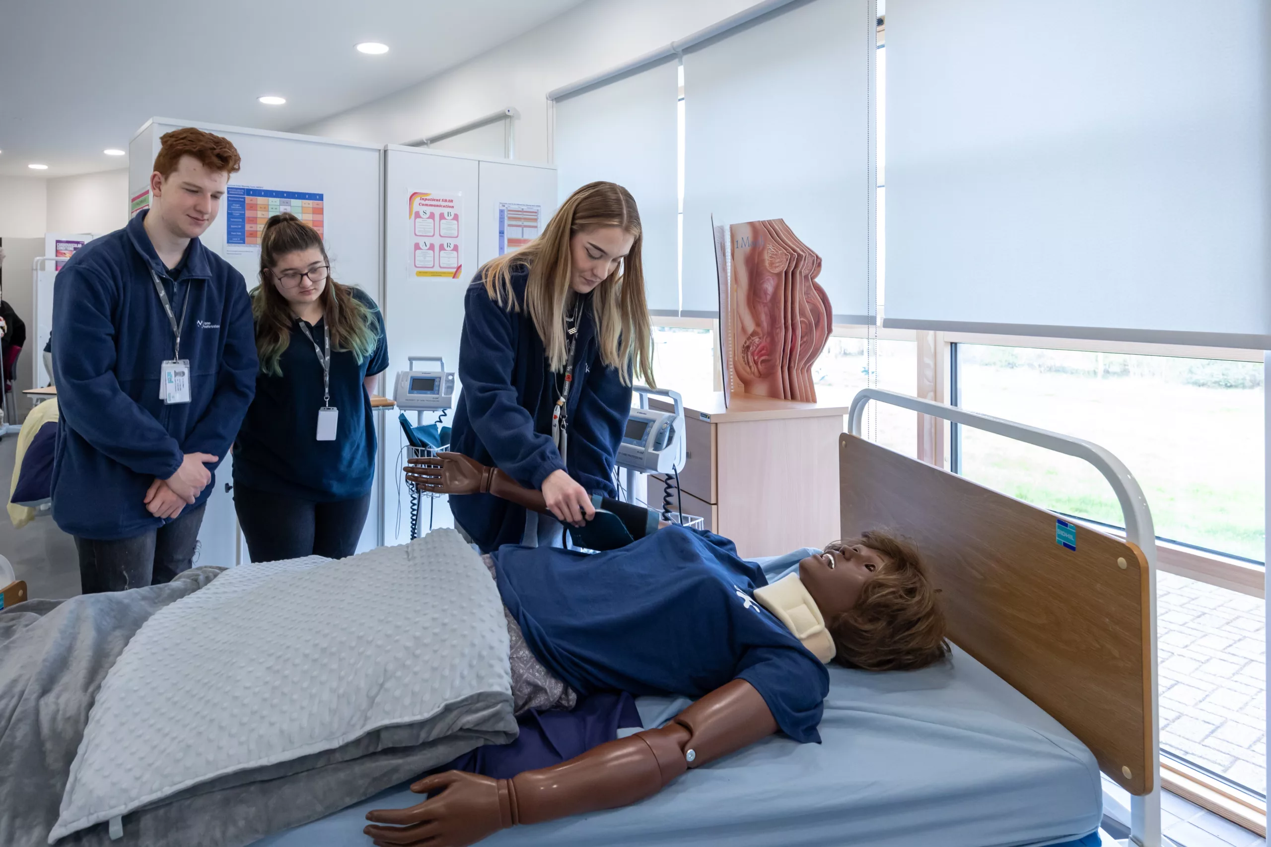 College students in a health lab working on an experiment