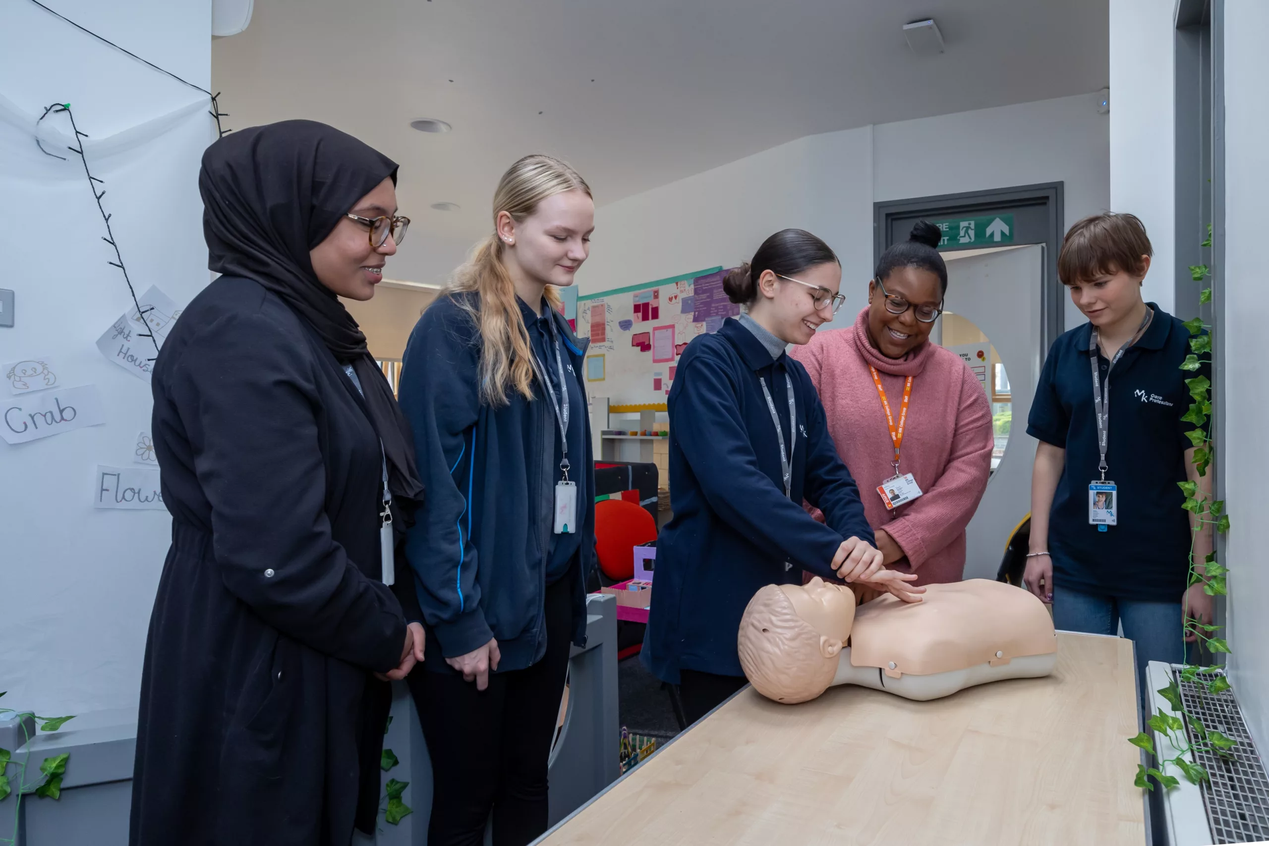 Students learning CPR