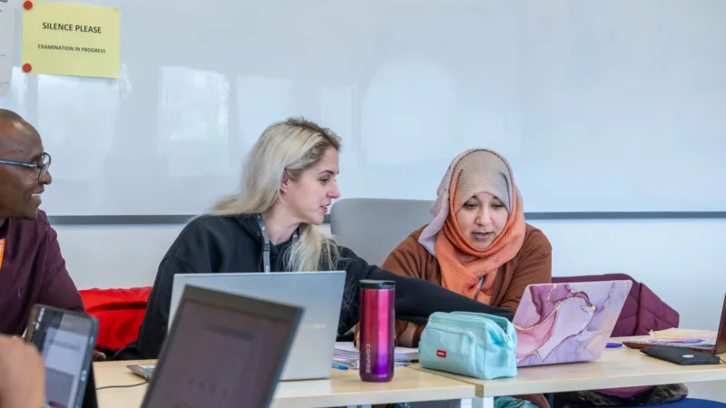 Students engaged in a collaborative learning session – A mixed group working together