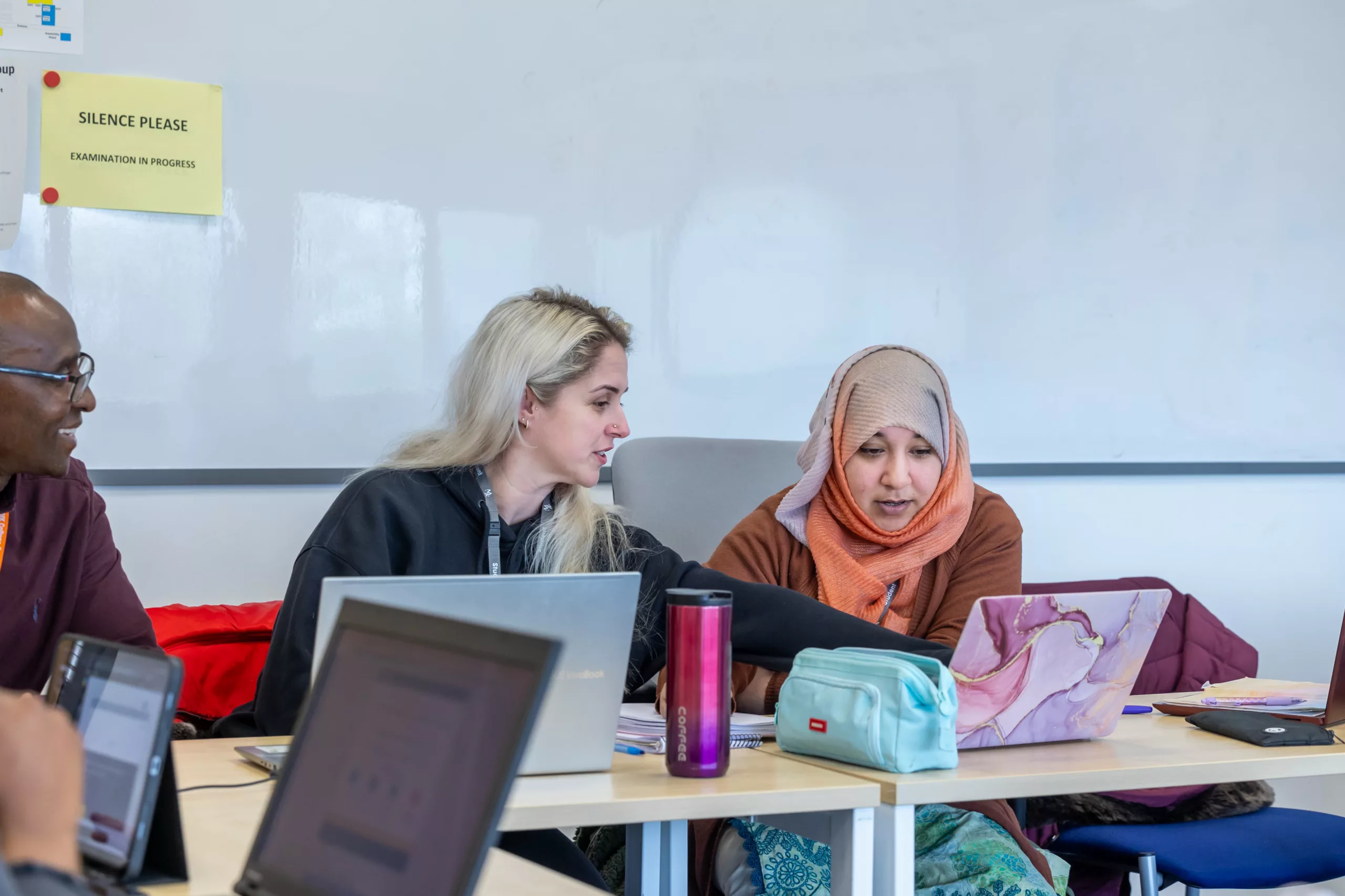 Students engaged in a collaborative learning session – A mixed group working together