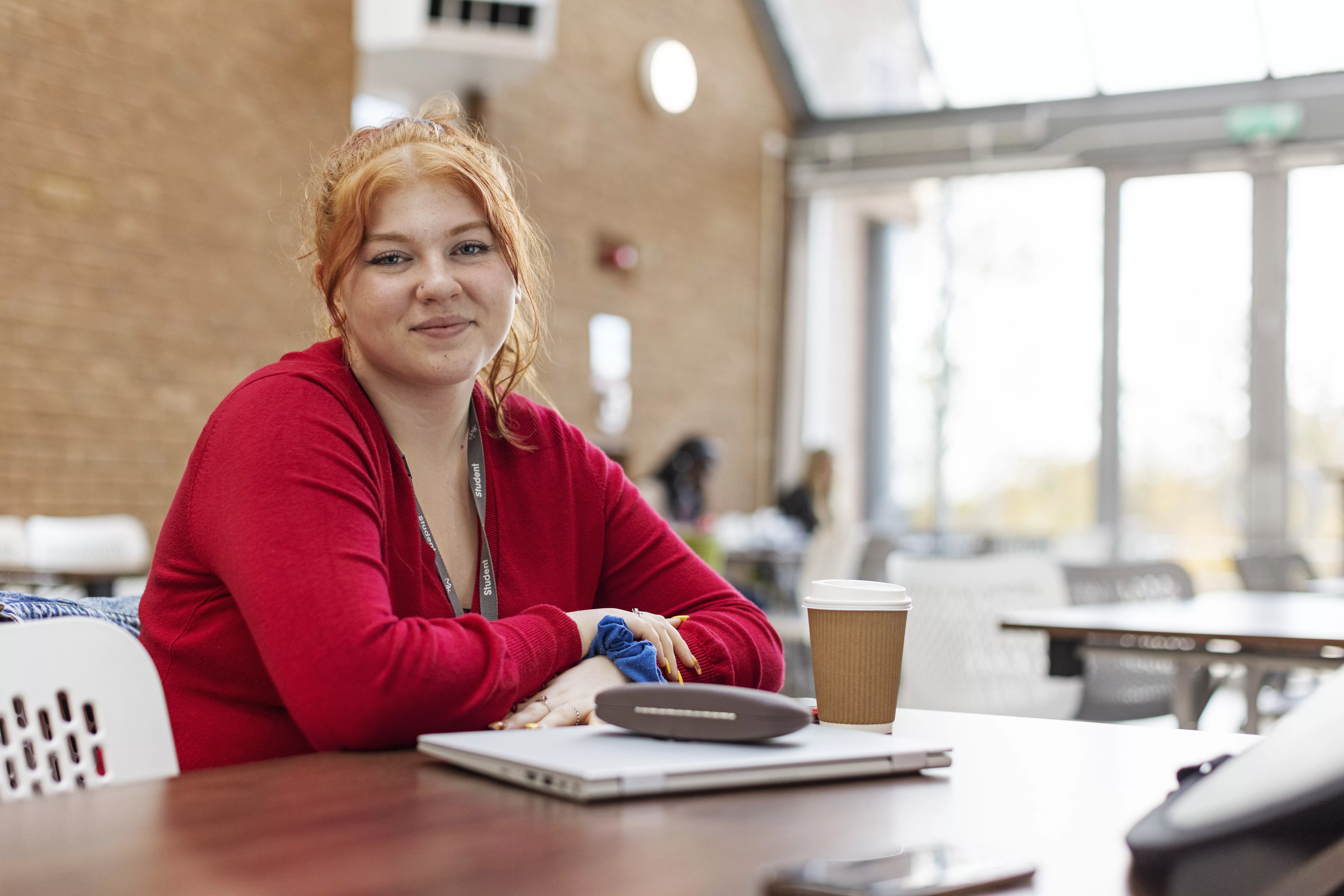 A woman sitting at a table,