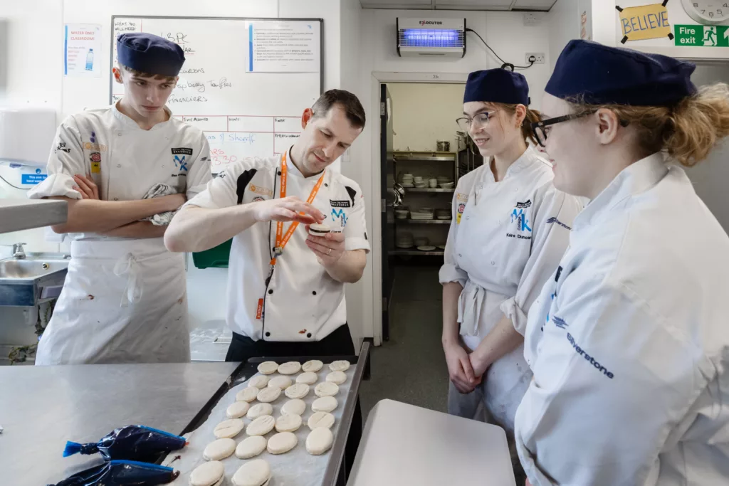 Culinary students with teacher