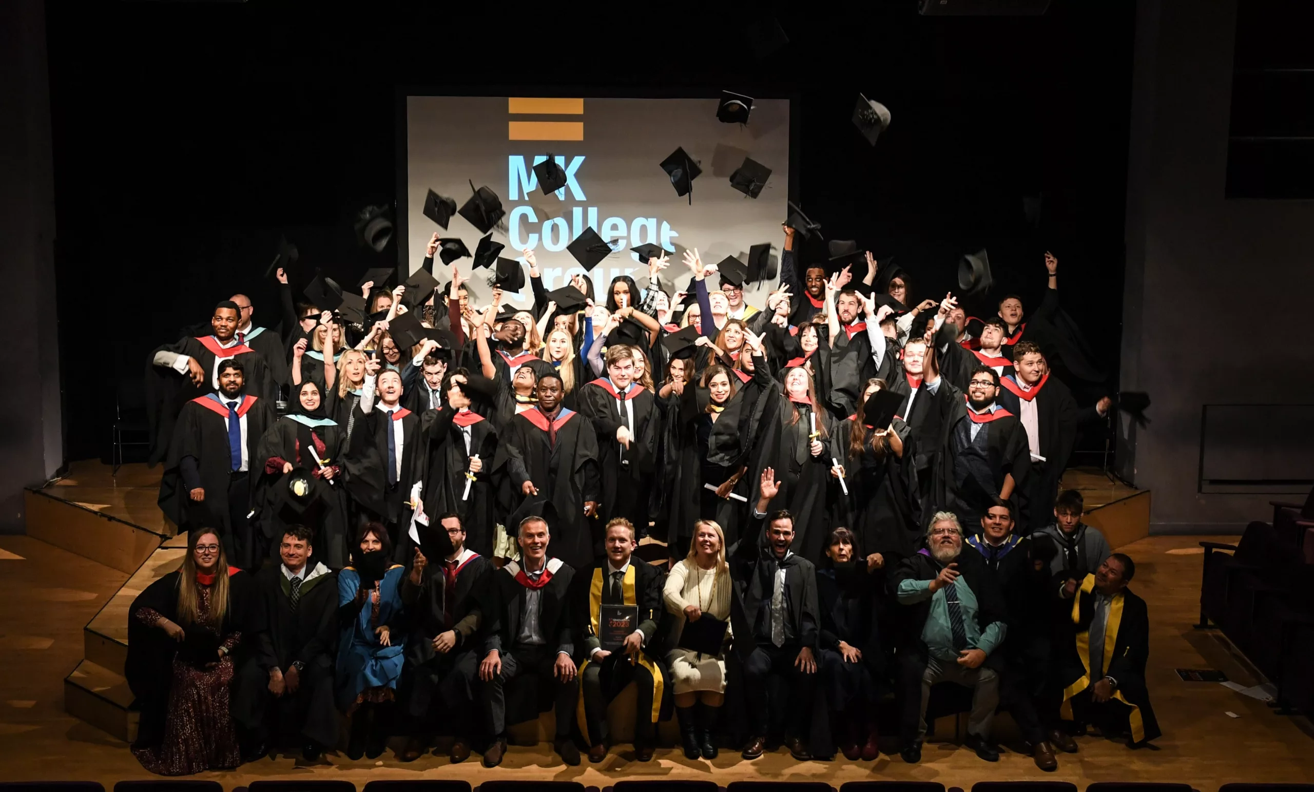Students celebrating at MK College graduation event