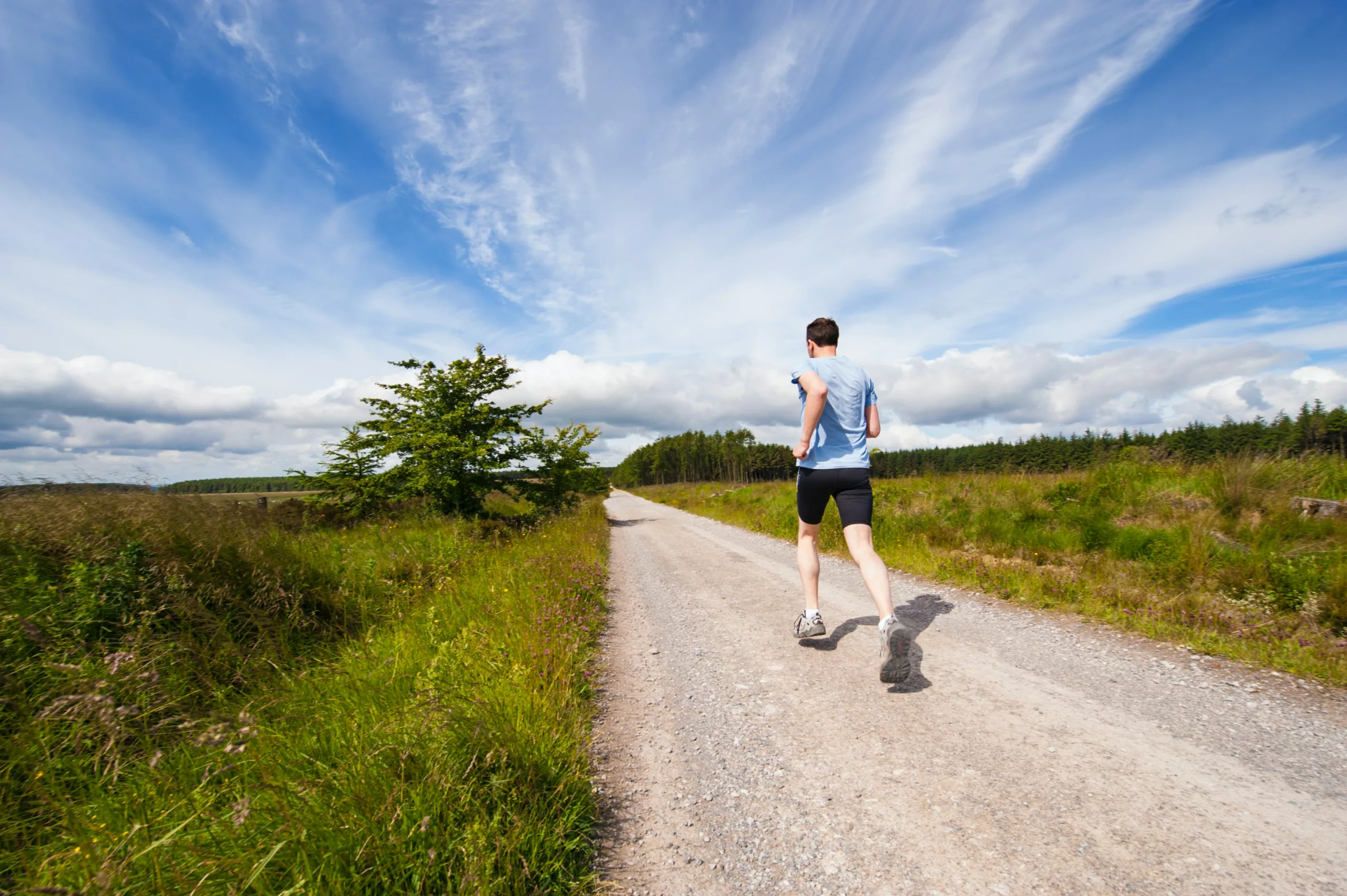 Man going for a run in the countryside.