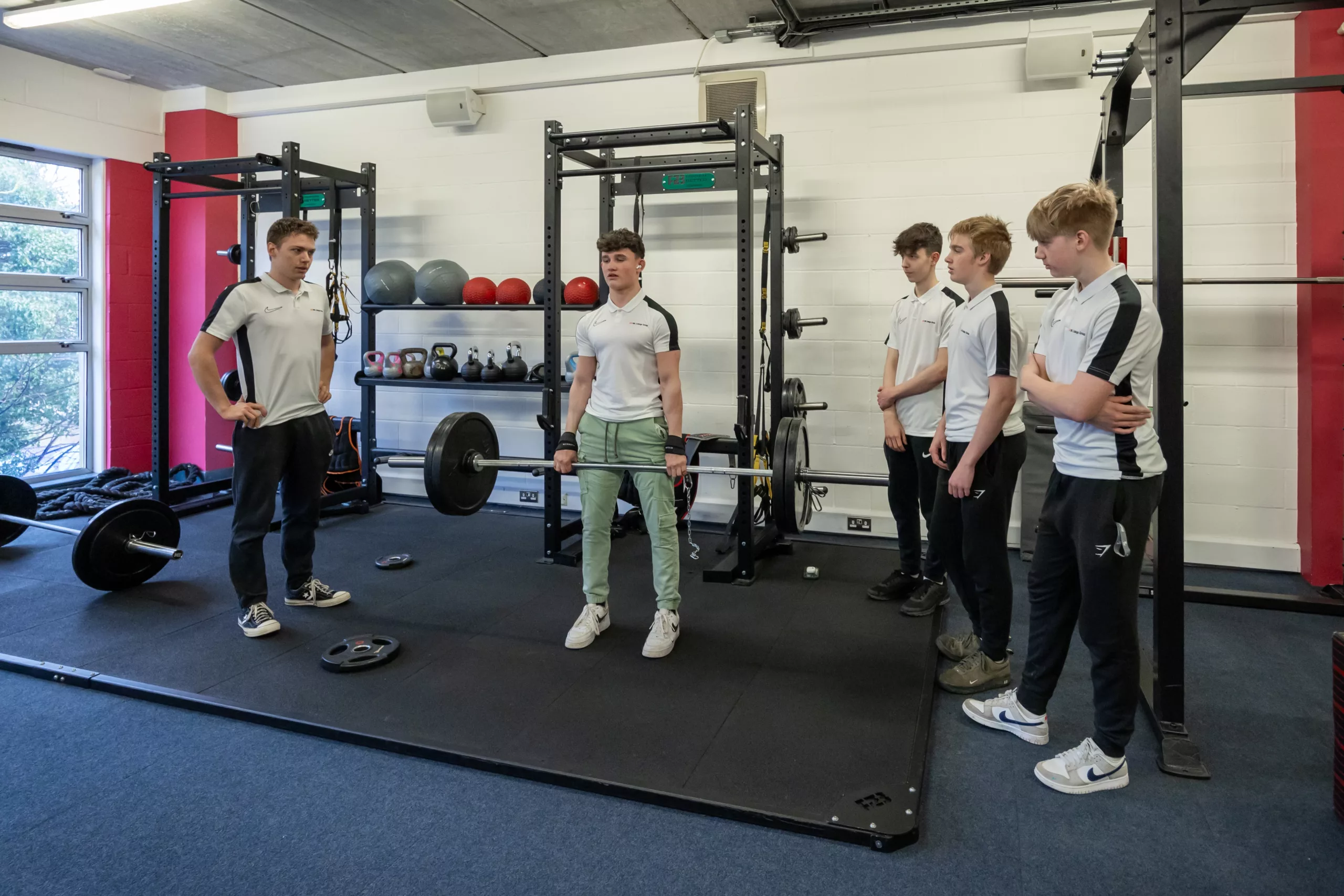 Sports students working out in gym